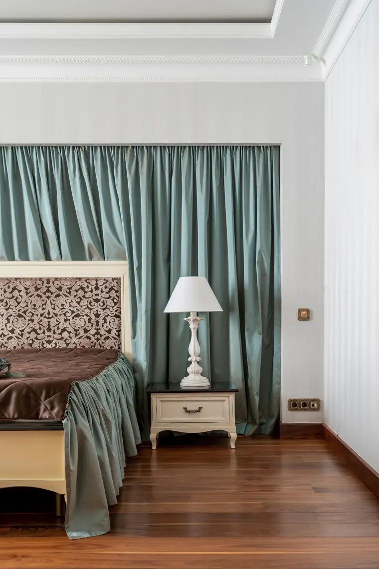 Bedroom with classic decor over laminate flooring