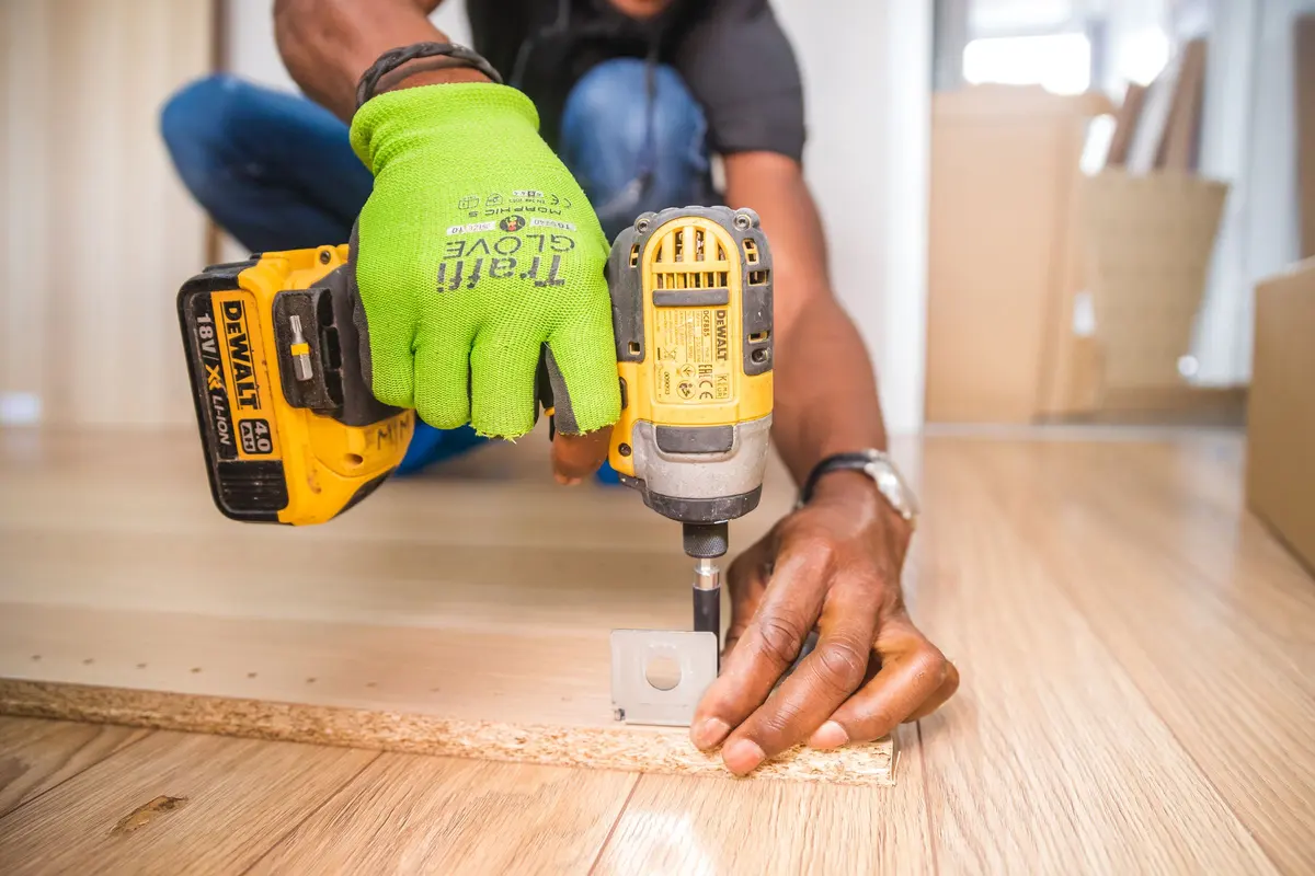 Screwing down a timber subfloor to stop movement and squeaks
