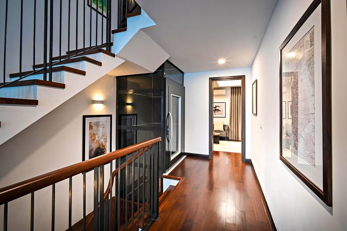 Corridor and staircase finished in matching wood-look flooring