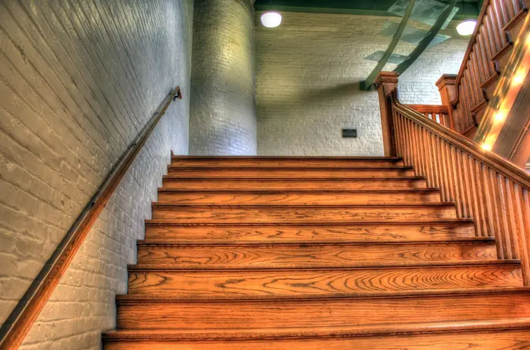 Timber staircase with treads and risers finished to match the floor